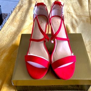 Red heels with across the toes strap